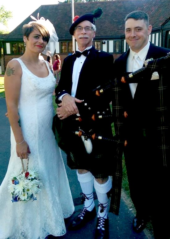 Piper with bride & groom